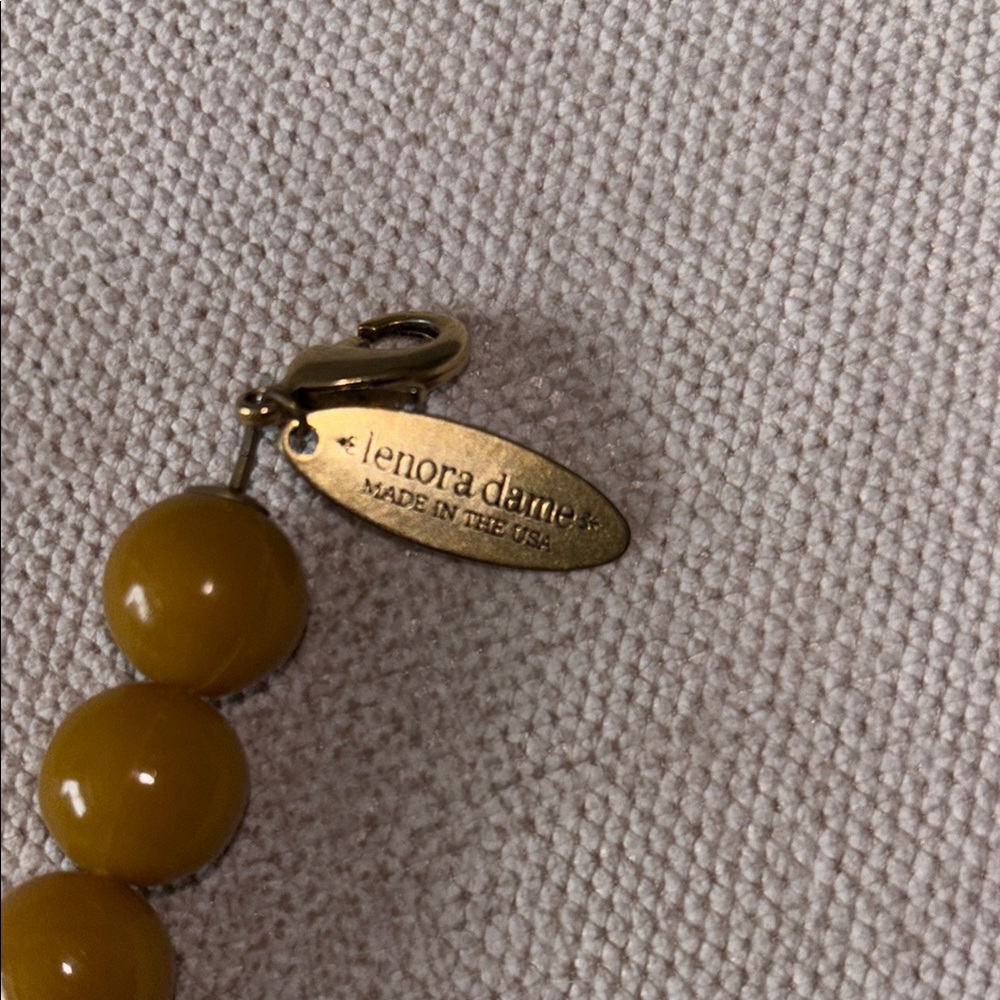 Yellow and Brown Beaded Necklace with Intricate Metal Accent - Picture 3 of 3